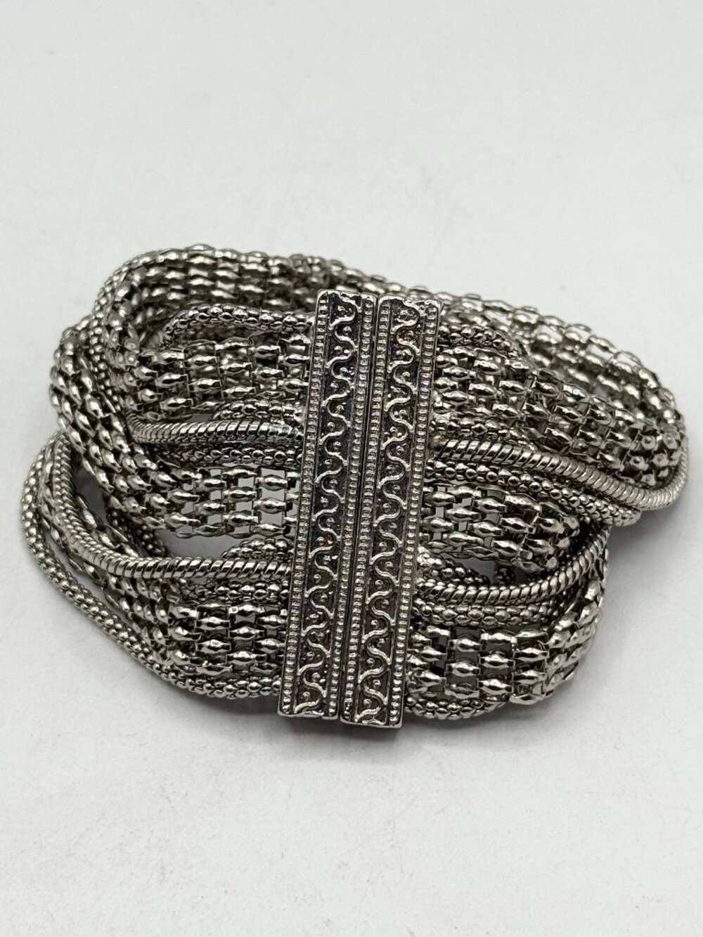 Silver tone multi strand chain bracelet
